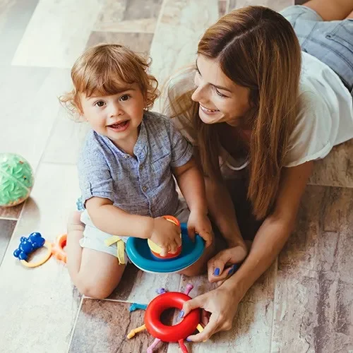 Mother and child playing with toys