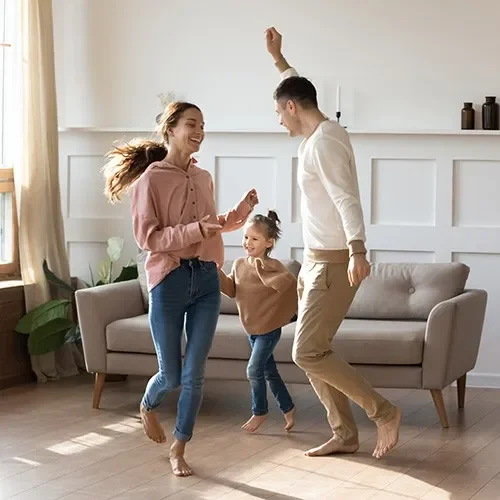 Family dancing happily