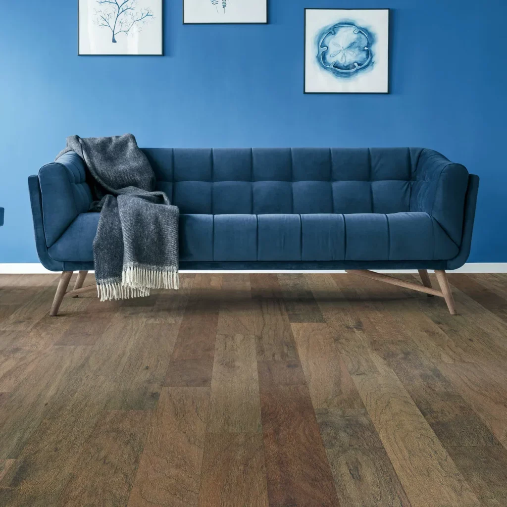 Hardwood in room with blue sofa