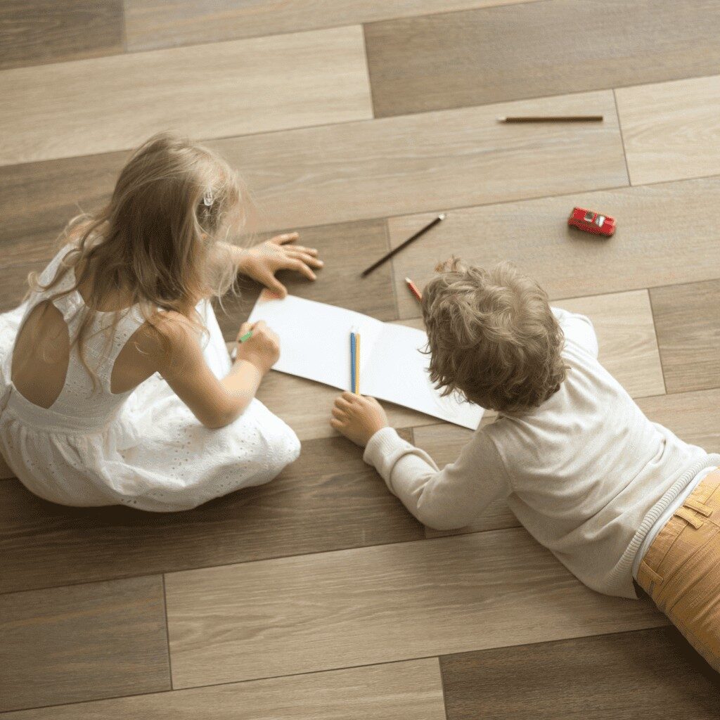 Kids playing on hardwood floors